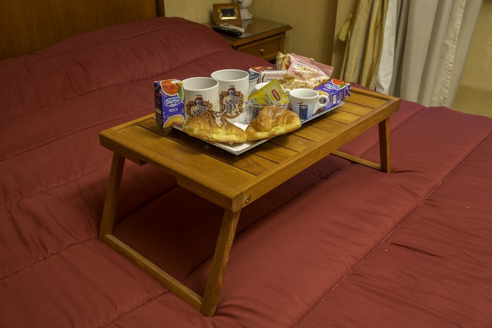 Фото Luxury Rooms H 2000 Roma