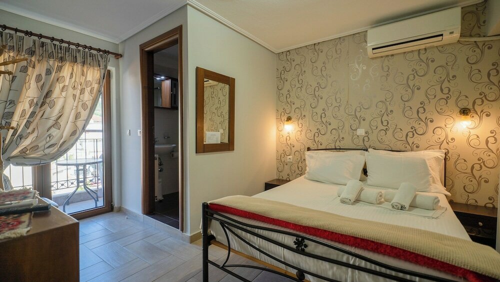 Фото Toti Boutique Rooms