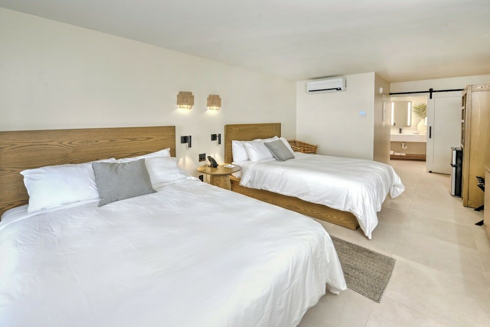 Фото Atlantic Ocean Palm Inn