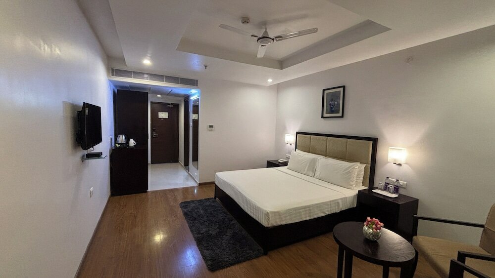 Фото Triguna Clarks Inn