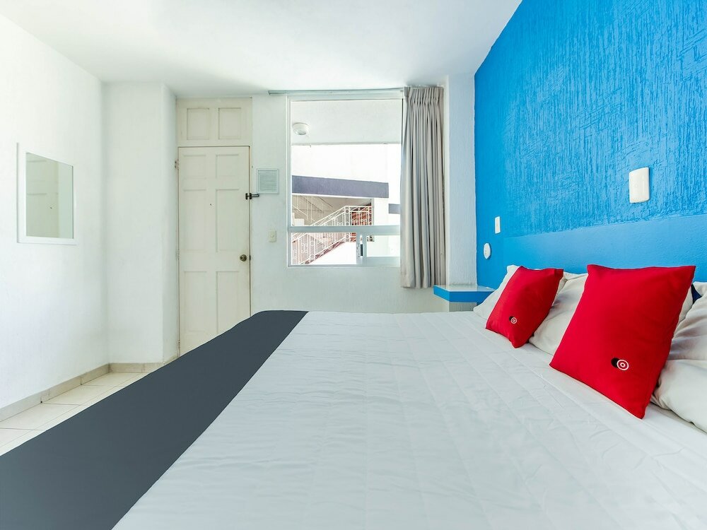 Фото Capital O Hotel El Mejicano