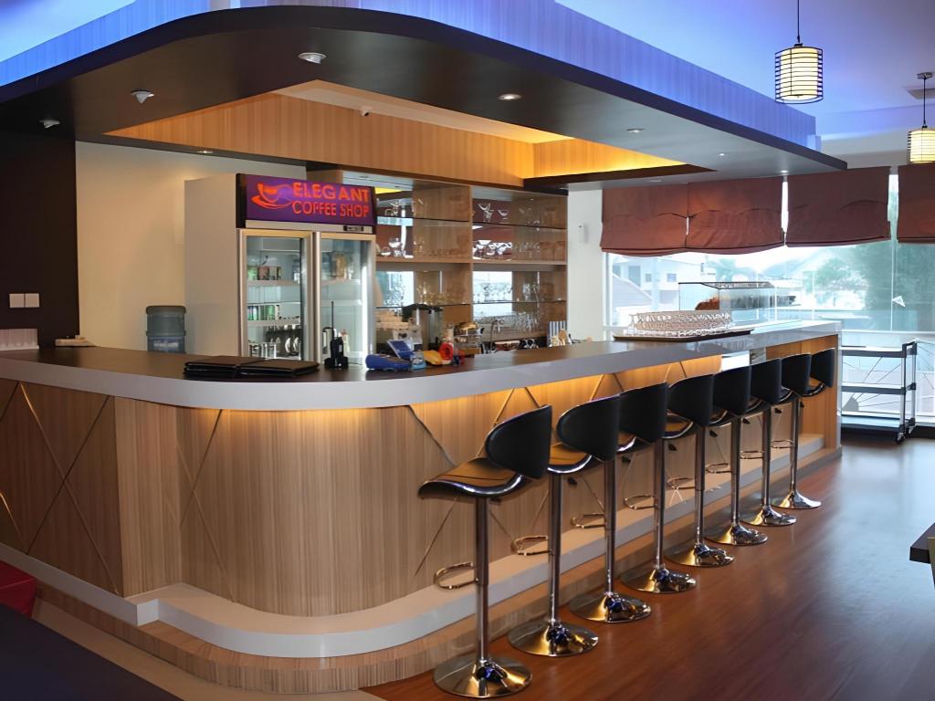 Фото Grand Impression Hotel Medan