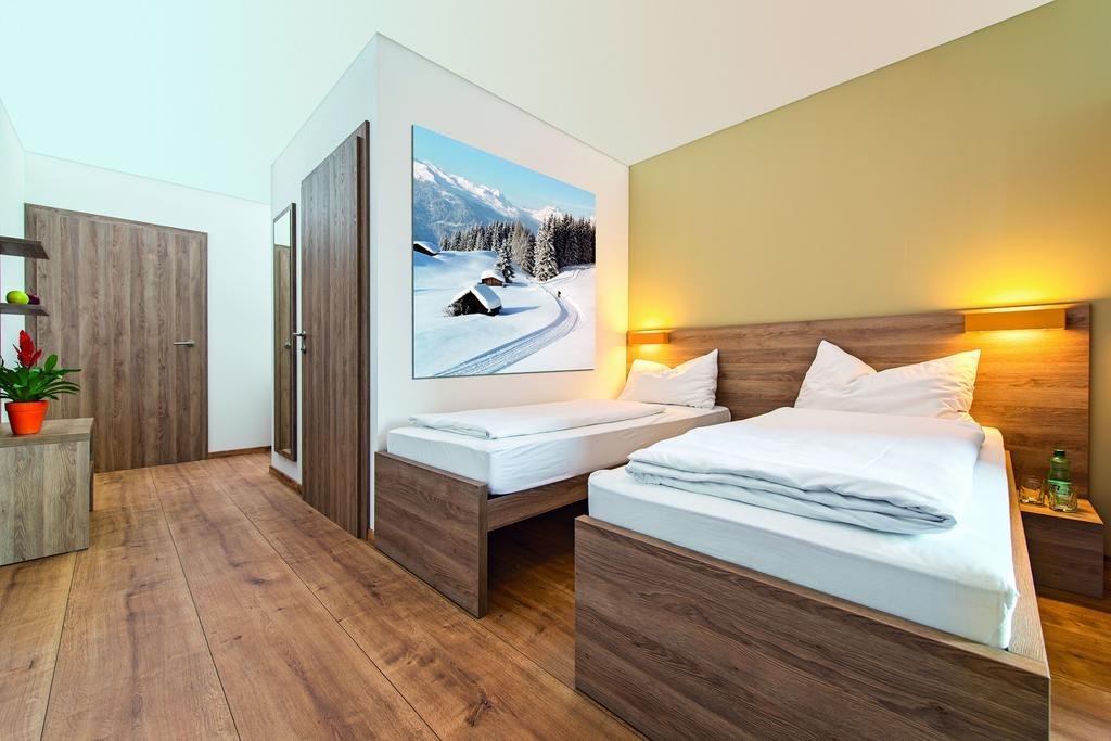 Фото Cooee alpin Hotel Kitzbüheler Alpen
