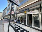 Real Emlak (Izmir, Menderes District, Cumaovasi Avenue, 19-21) ، وكالة عقارية