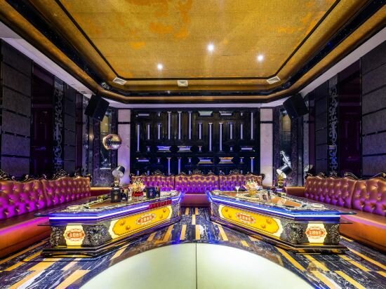 Фото Auden International Hotel