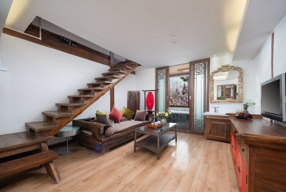 Фото Merry Inn Lijiang