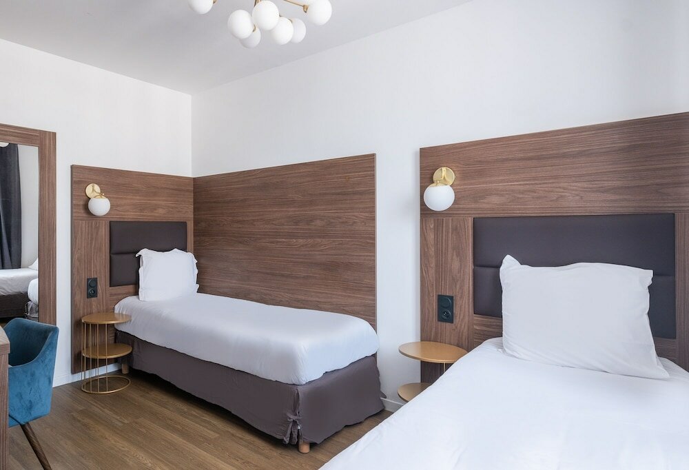 Фото The Originals Boutique, Hôtel Le Marignan, Le Havre Centre Gare