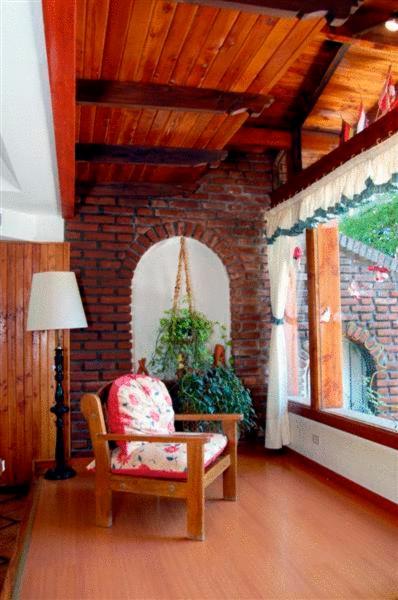 Фото Ruca Cheli Village Ski Hotel