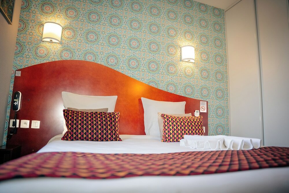 Фото Hôtel Les Commerçants