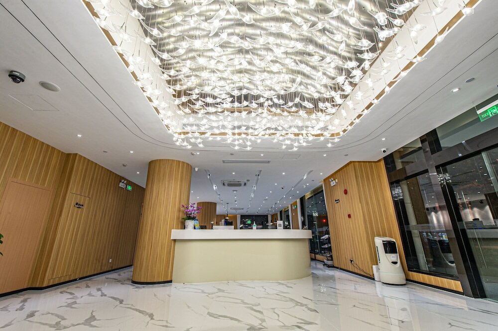 Фото Shanghai Joyful Yard Hotel