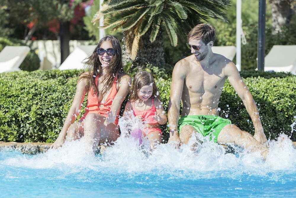 Фото Merit Crystal Cove Hotel