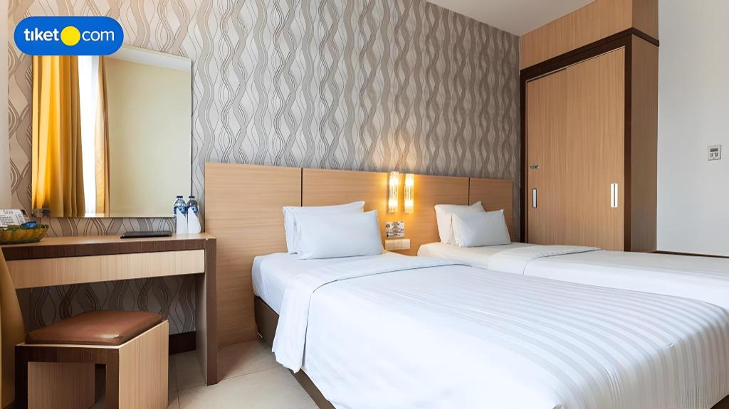 Фото Grand Impression Hotel Medan