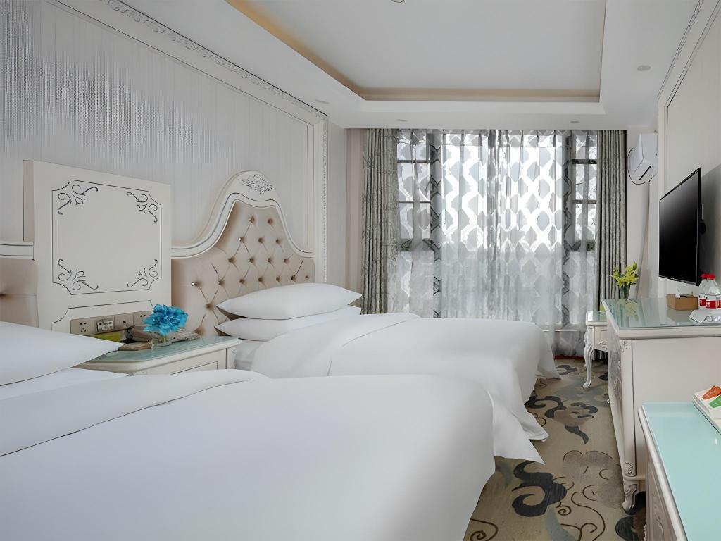 Фото Vienna Classic Hotel Kunming Airport Branch