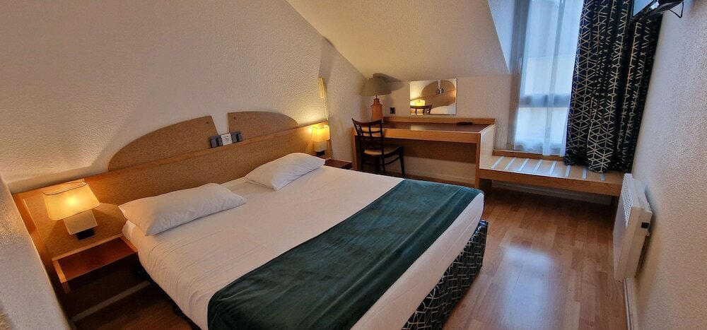 Фото Kyriad Direct Arpajon