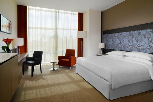 Гостиница Sheraton Milan Malpensa Airport Hotel & Conference Center