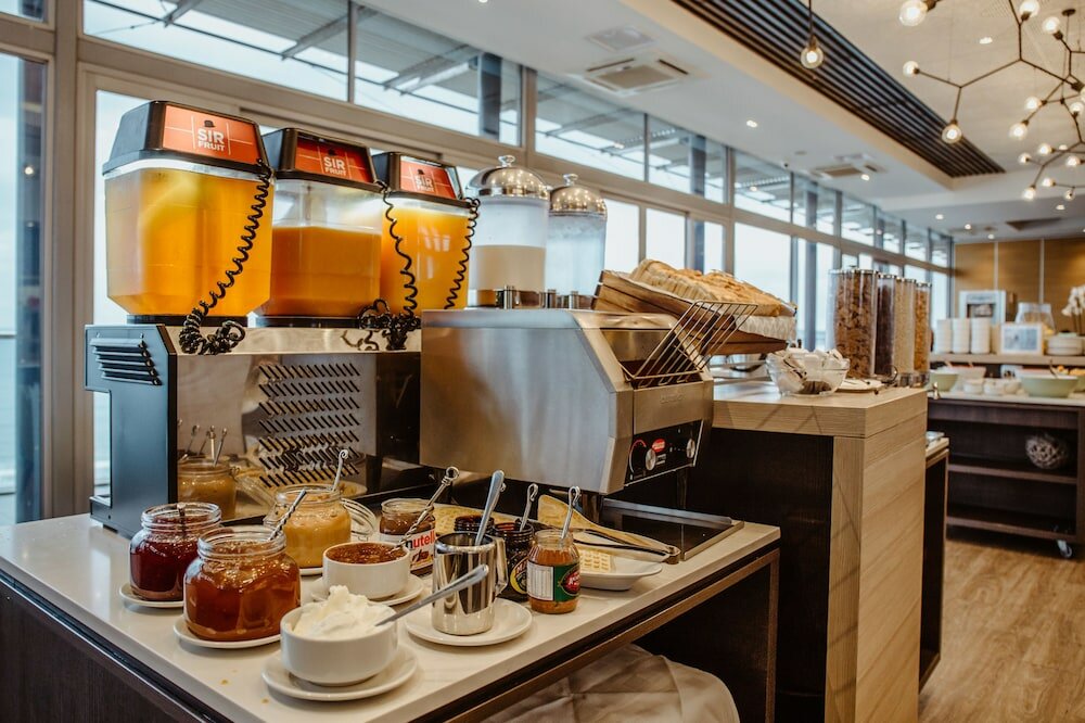 Фото Belaire Suites Hotel