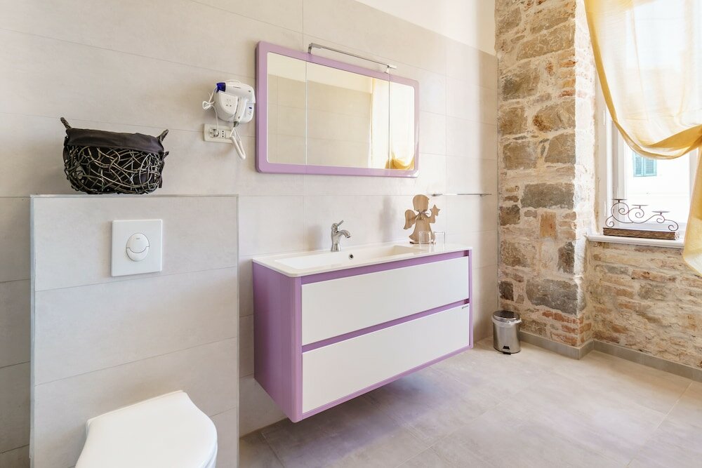 Фото Pietra Rossa Luxury Rooms