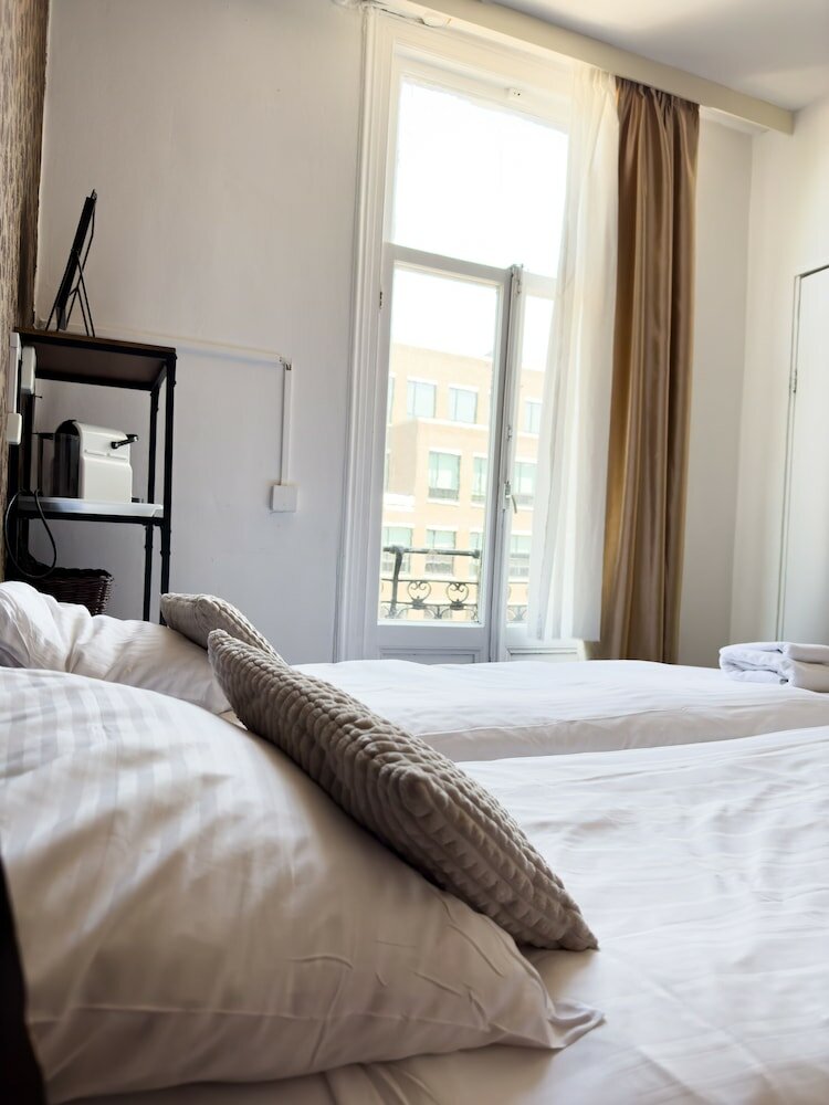 Фото Amsterdam Inn Hotel