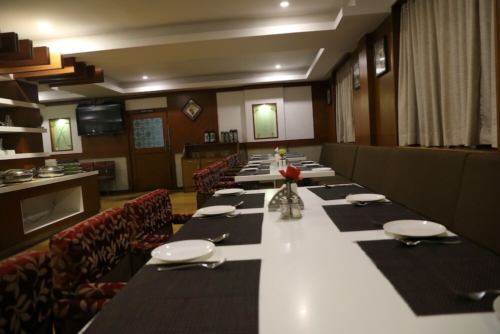 Фото Maple Tree Hotels