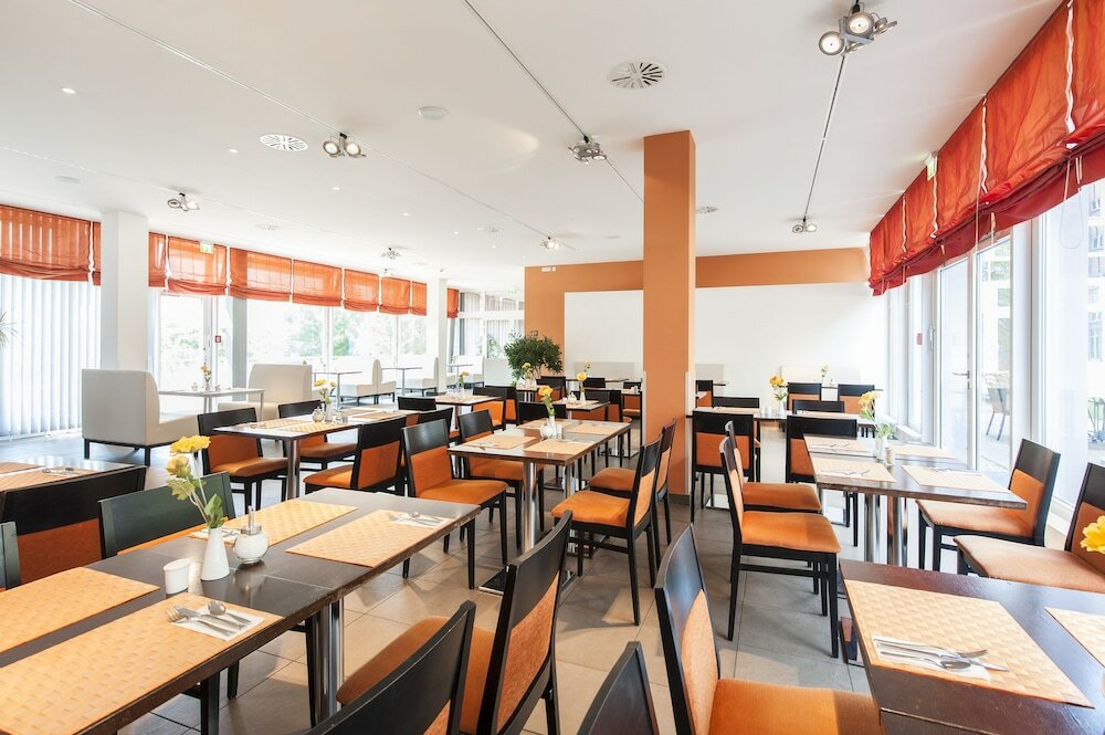 Фото Acom-Hotel Munich