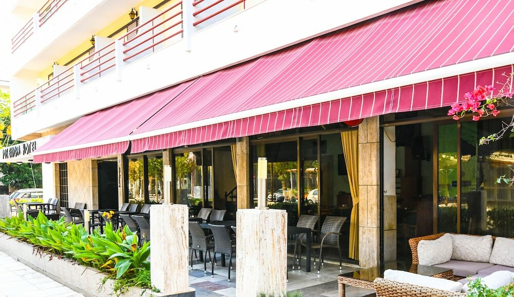 Фото Poseidon Hotel and Apartments