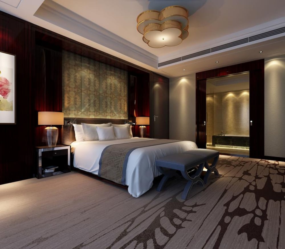 Фото Grand New Century Hotel Fuyang