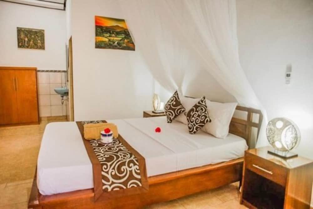 Фото Artha Dewata Home Stay