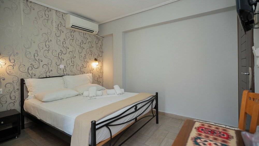 Фото Toti Boutique Rooms