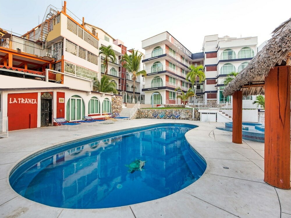 Фото Capital O Hotel El Mejicano