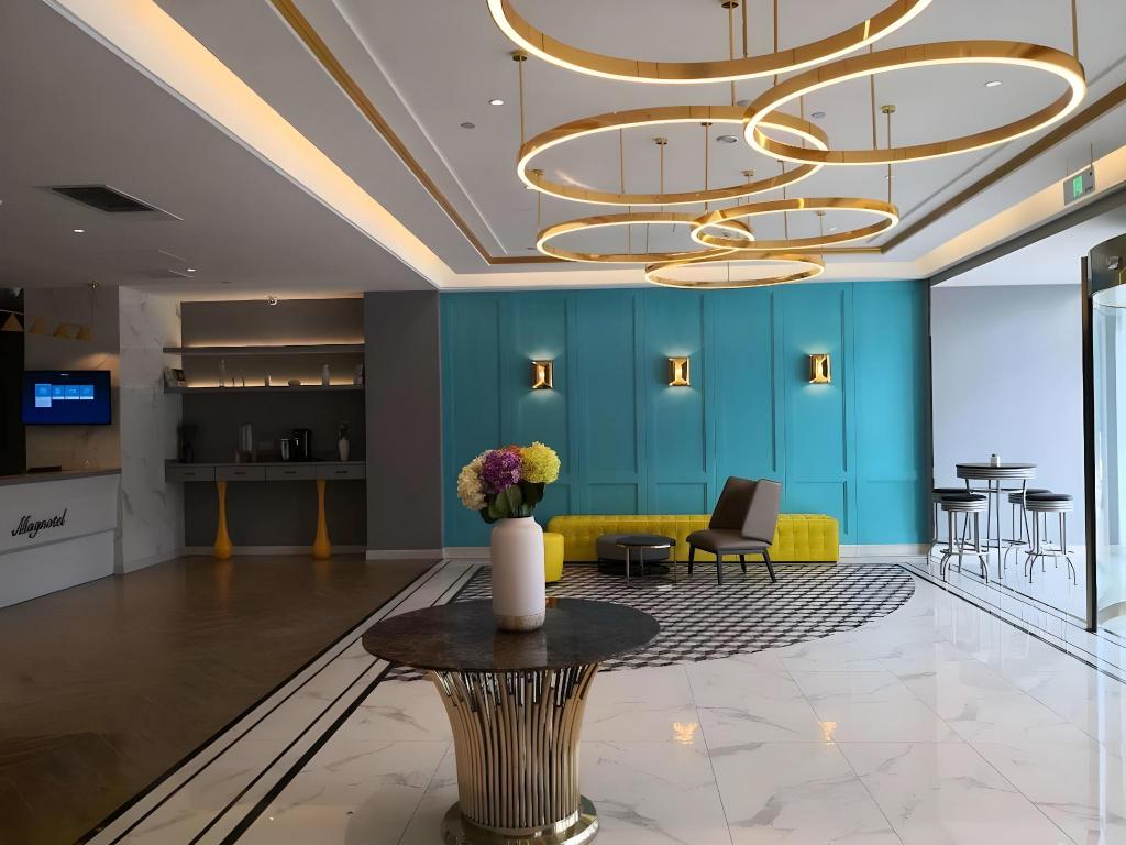 Фото Magnotel Jining Jiaxiang, Zengzi Avenue Hotel