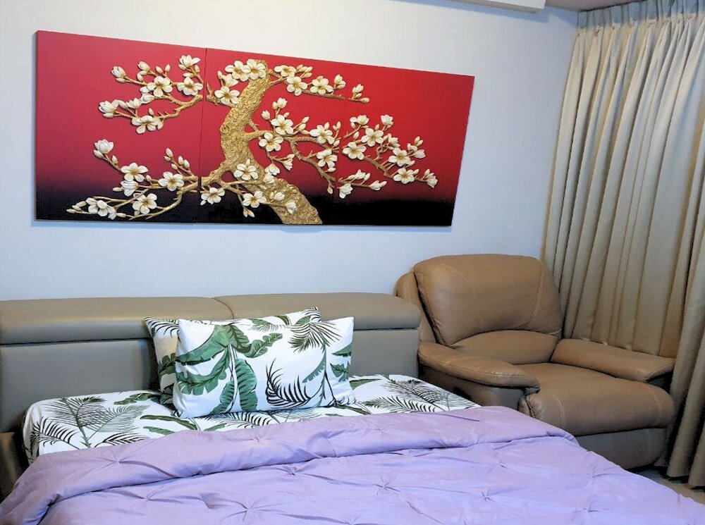 Фото Tess and Tessha Condotel near T3 Airport