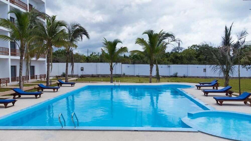 Фото Malika Nungwi Hotel