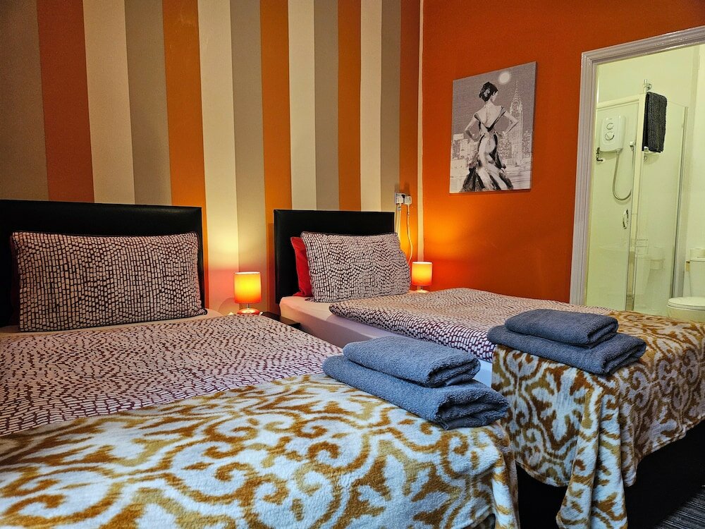 Фото Robin 7 Lodge City Centre