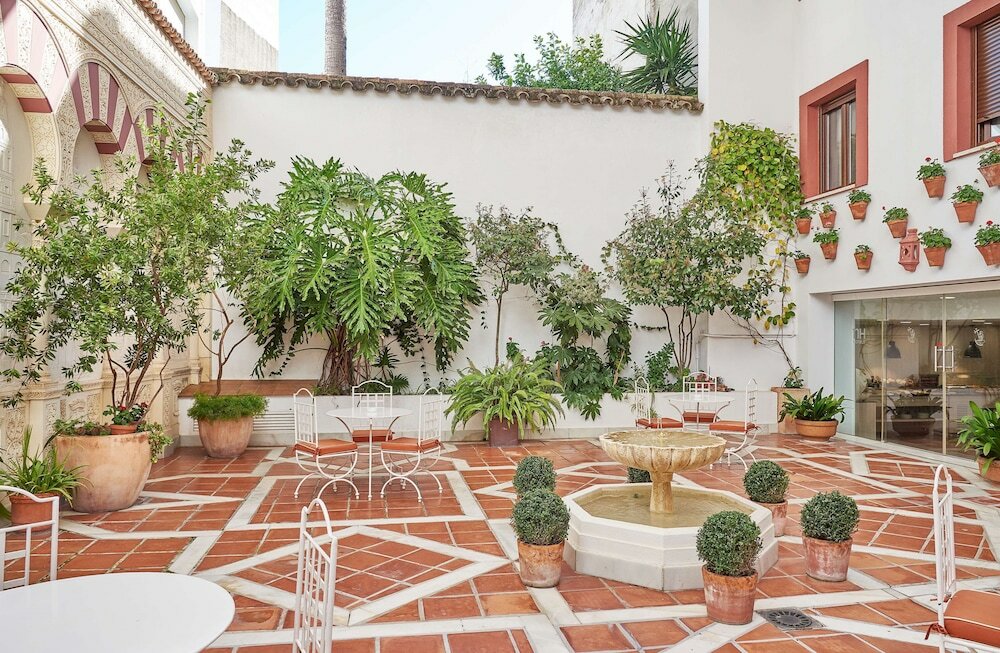 Фото Nh Córdoba Califa Hotel