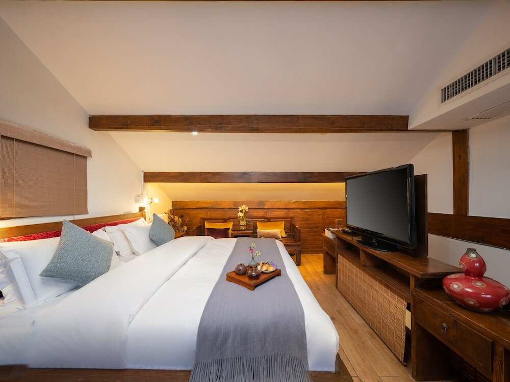 Фото Merry Inn Lijiang