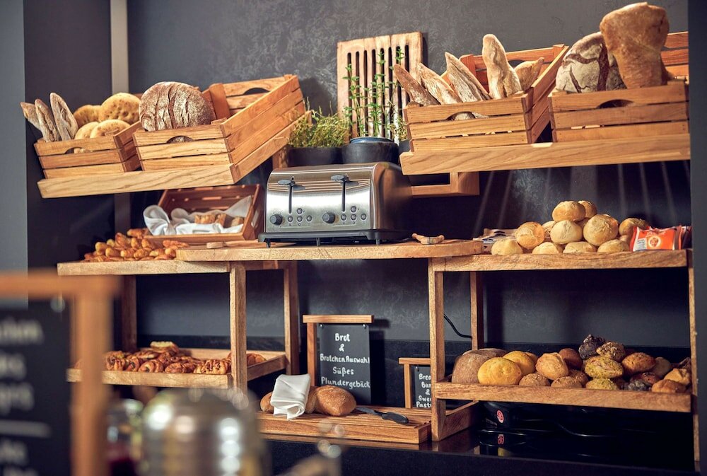 Фото Wasserturm Hotel Cologne, Curio Collection by Hilton