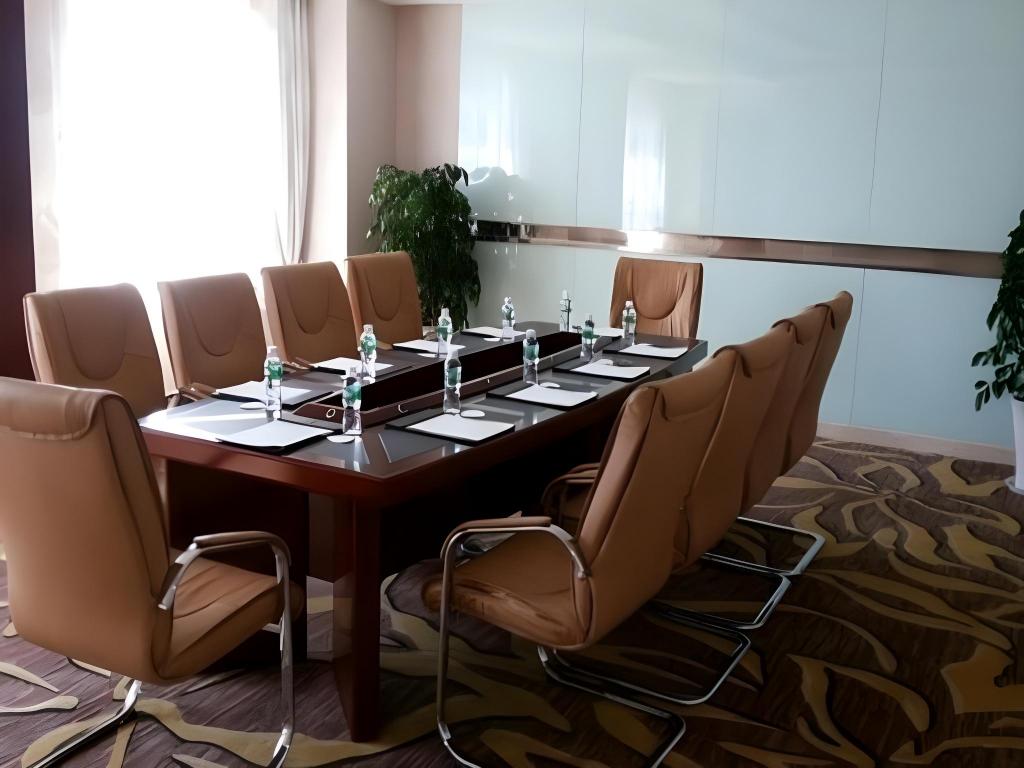 Фото Qingdao Huaxi Hotel