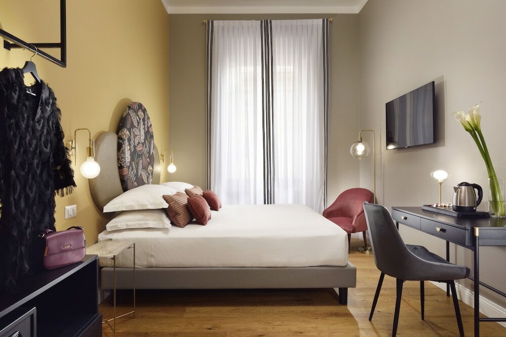 Фото Dimora ai Fori - Guesthouse