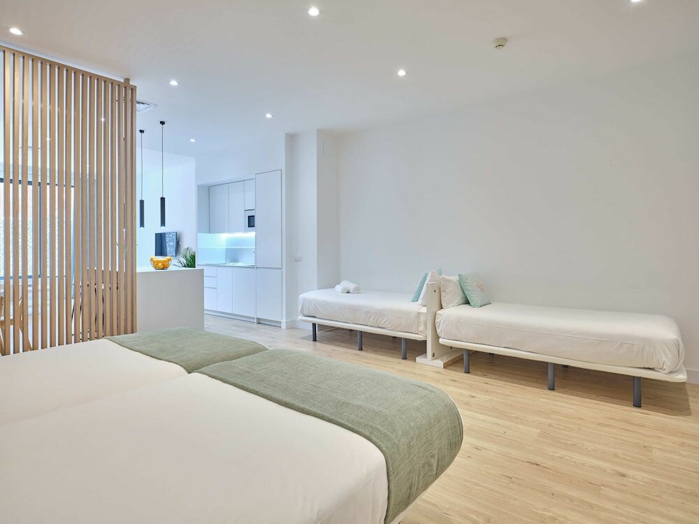 Фото Paseo Suites Hotel