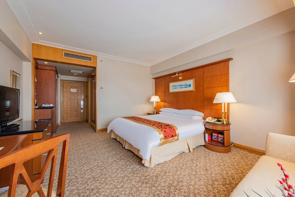 Фото Ruishi Hotel Dalian