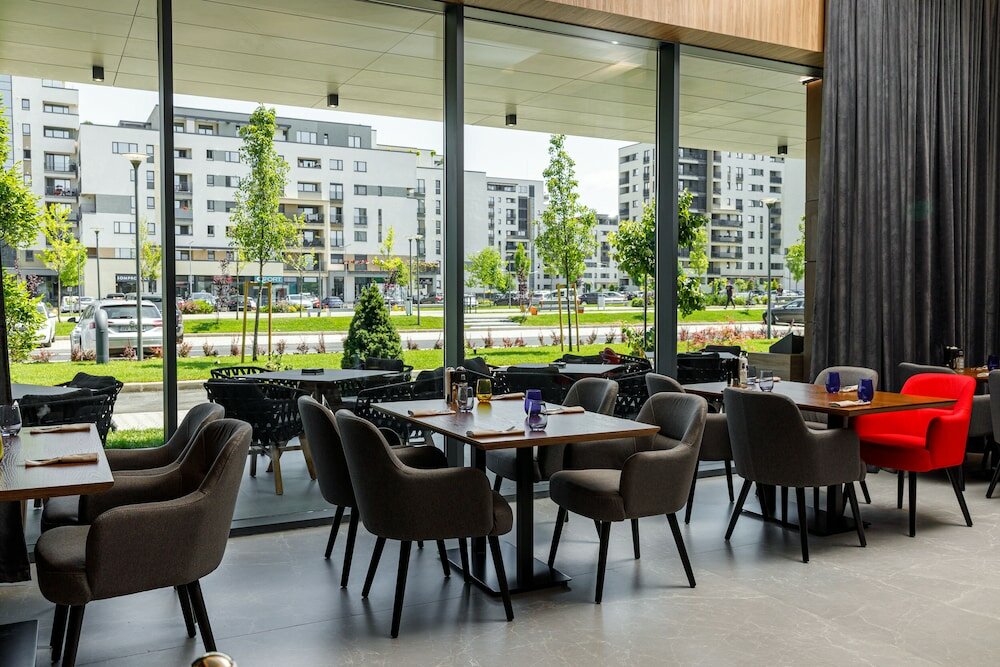 Фото Qosmo Brasov Hotel