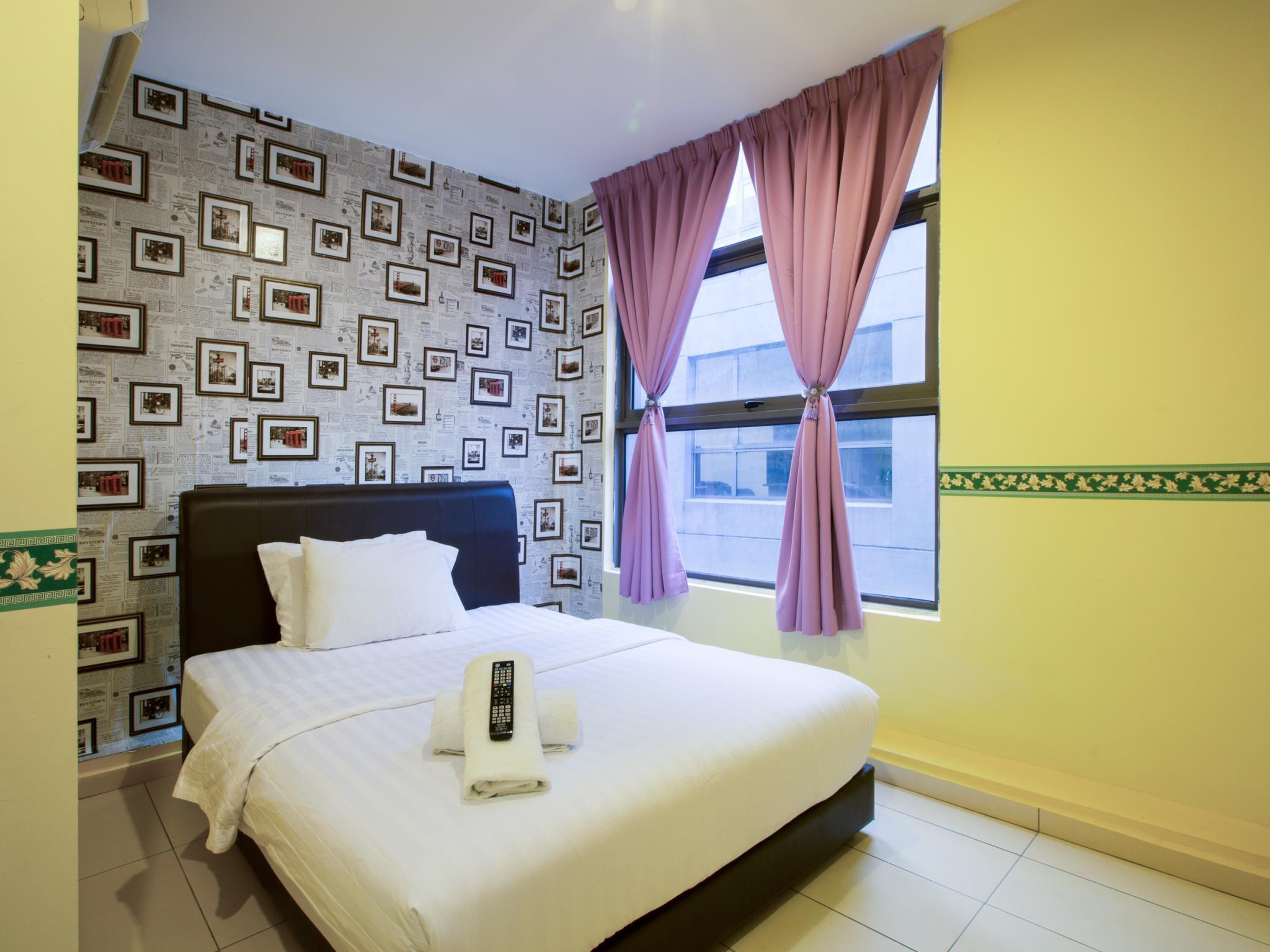 Фото Hotel Zamburger Sungai Besi