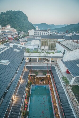 Гостиница Maosao Inn в Хунани