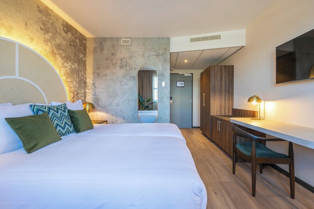 Фото Leonardo Hotel Breda City Center