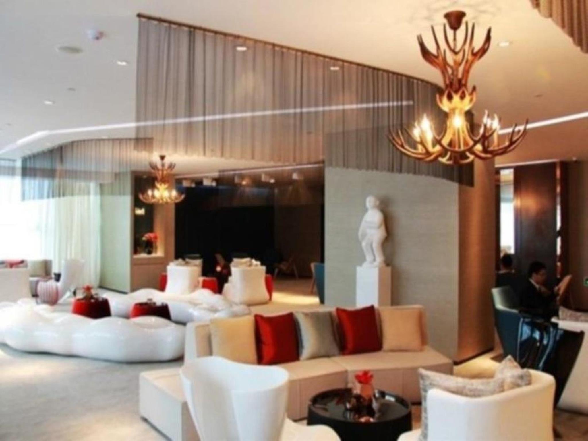 Фото Himalayas Qingdao Hotel