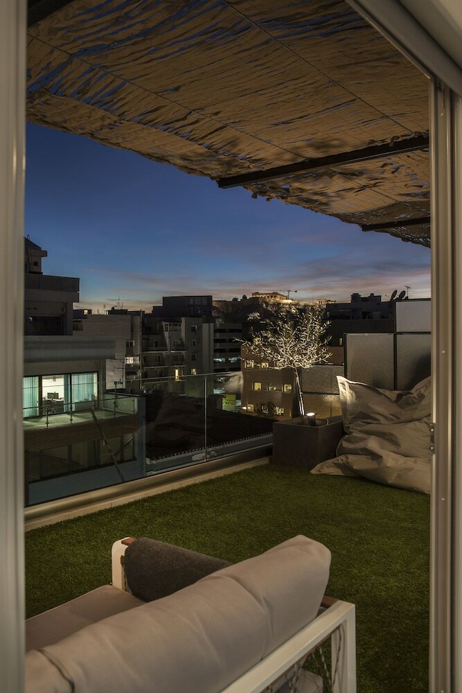 Фото The Athenians Art Apartments