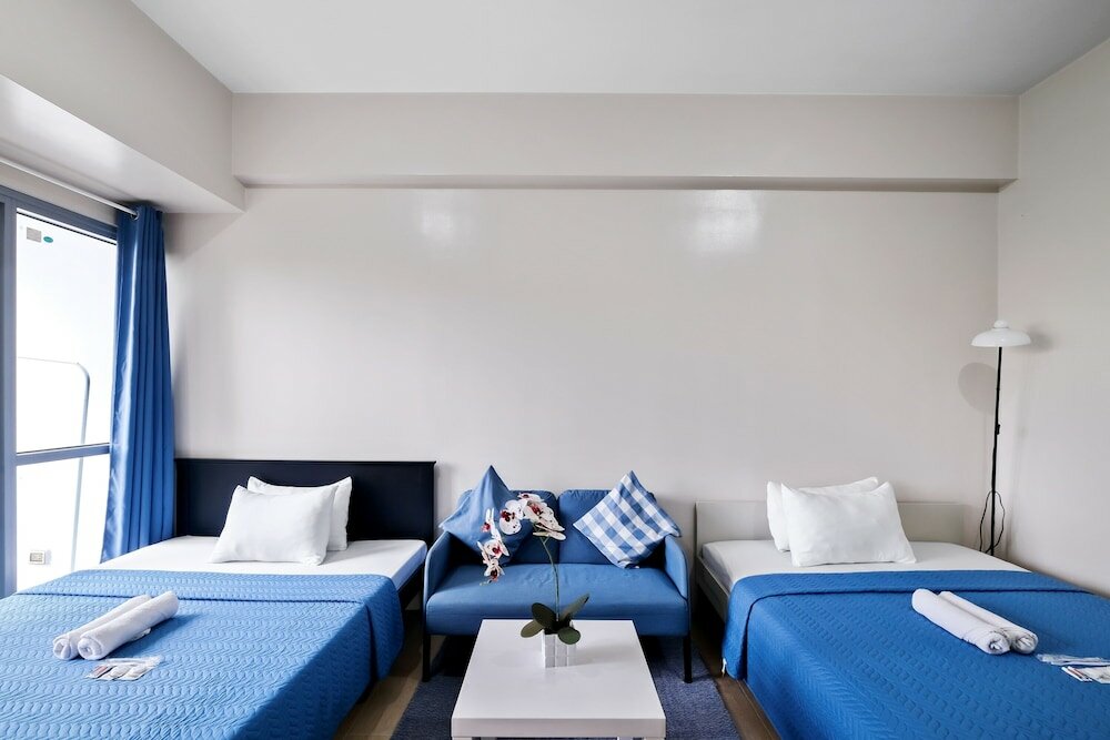 Фото Tess and Tessha Condotel near T3 Airport