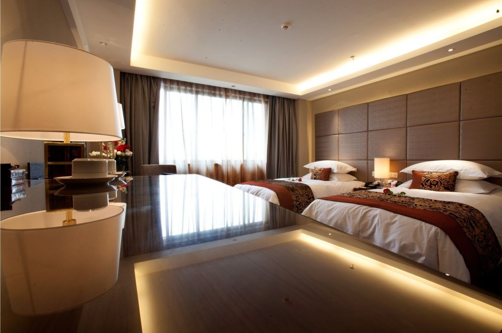 Фото Yiwu Wendemu International Hotel