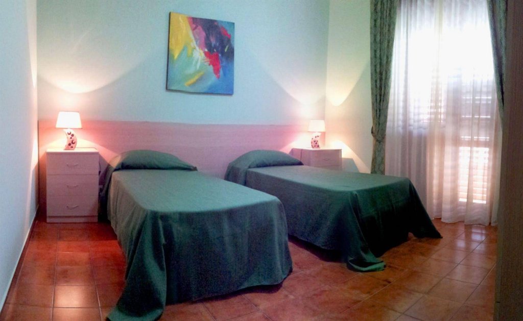 Фото Cassiodoro Rooms Affittacamere