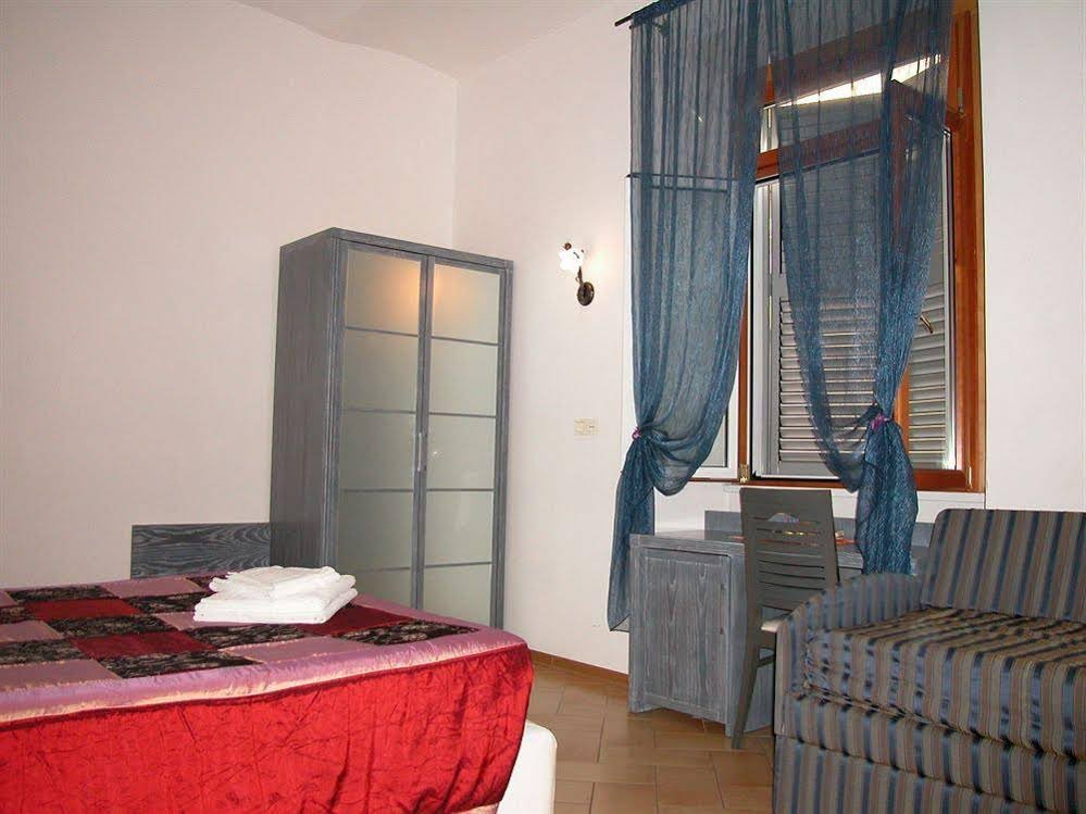 Фото B&t Rooms Trani